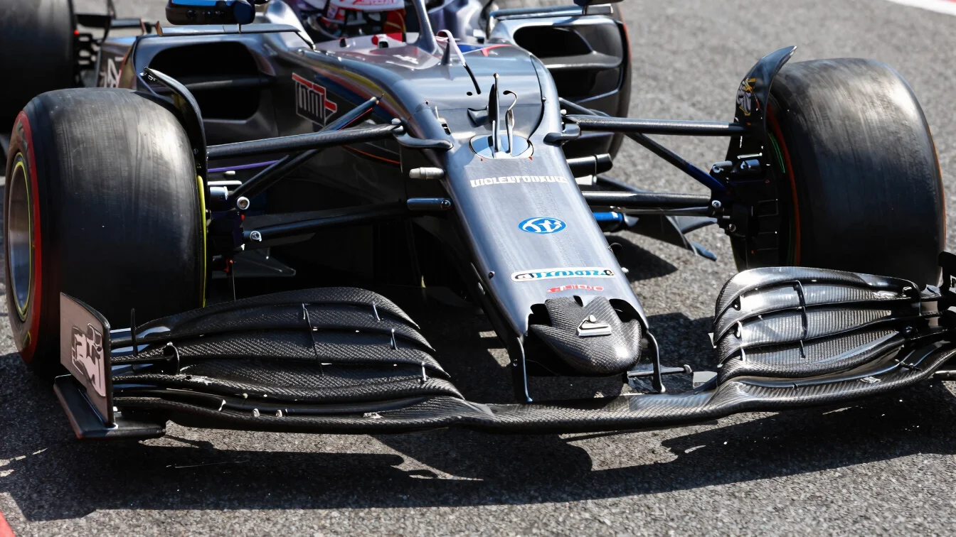 Close-up of F1 car's rear diffuser and floor, sharp detail, clean studio lighting, carbon fiber texture